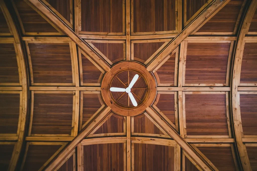 Ceiling fan installed on a wood ceiling in an Owasso home