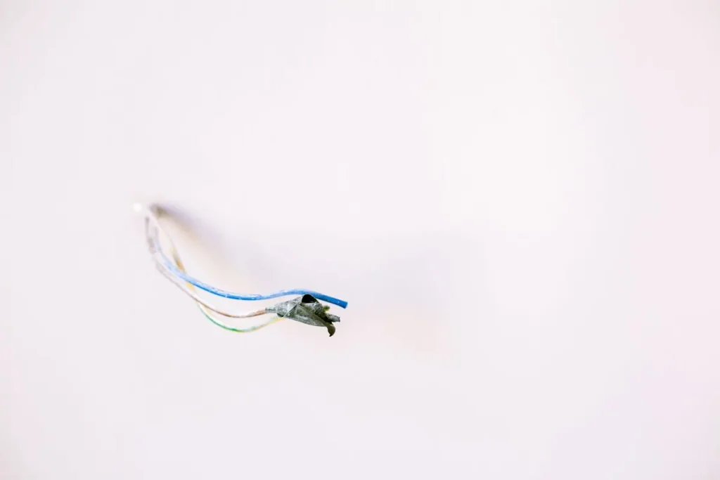Old wiring pulled from a wall during a rewiring project